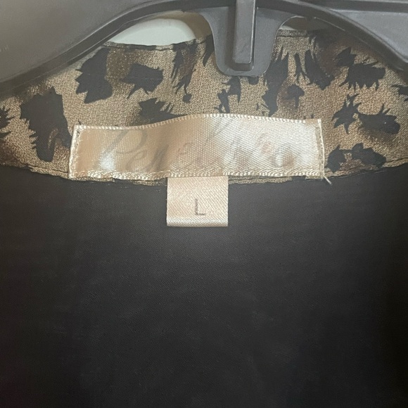 Penelope brand black sheer blouse with leopard detail. Size lg Good condition - Picture 2 of 4